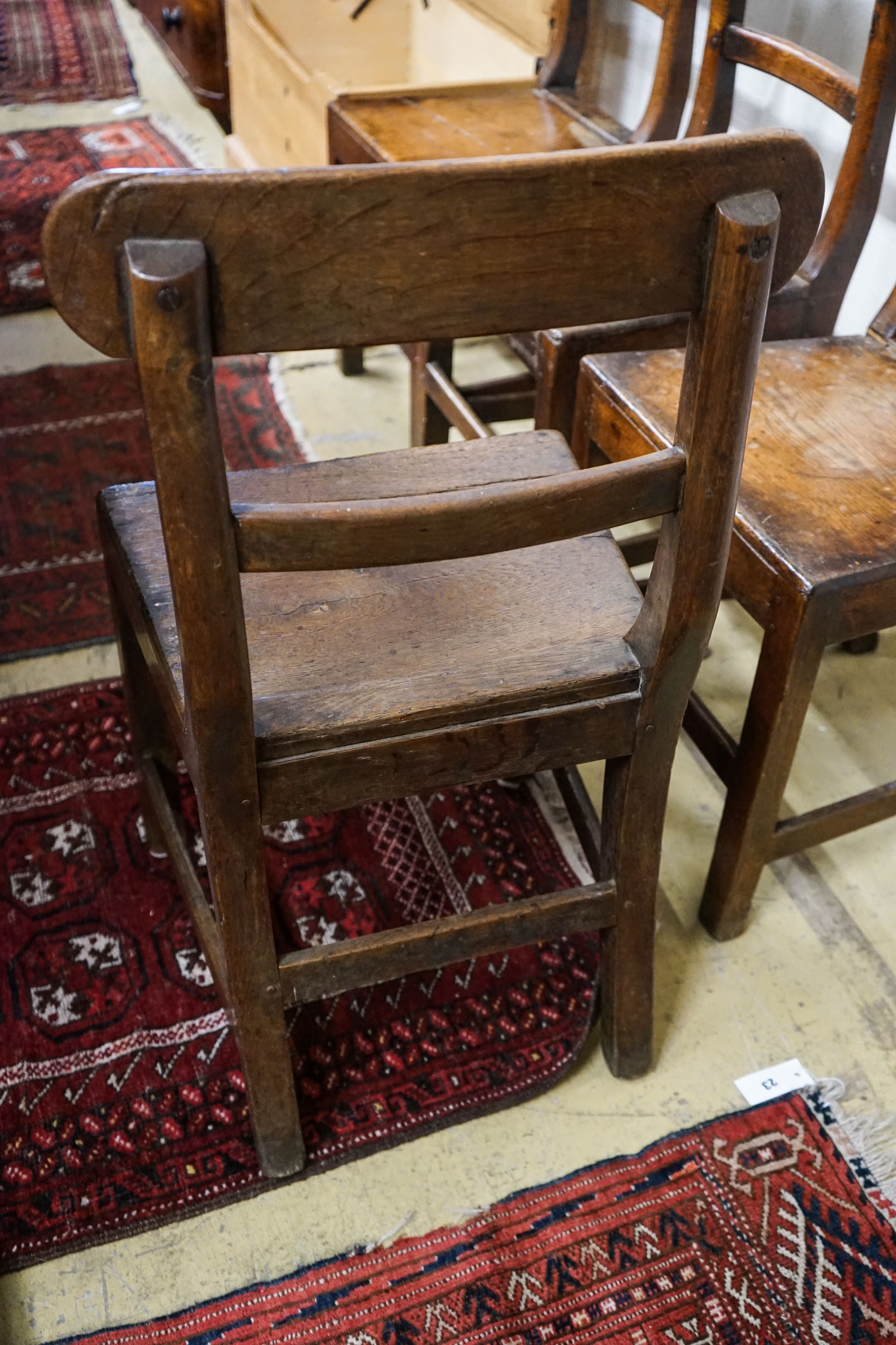 A set of five early 19th century Welsh provincial oak dining chairs